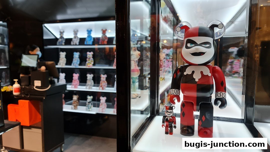 ActionCity Bugis Junction displays collectible Bearbrick figures, including a large Harley Quinn design.