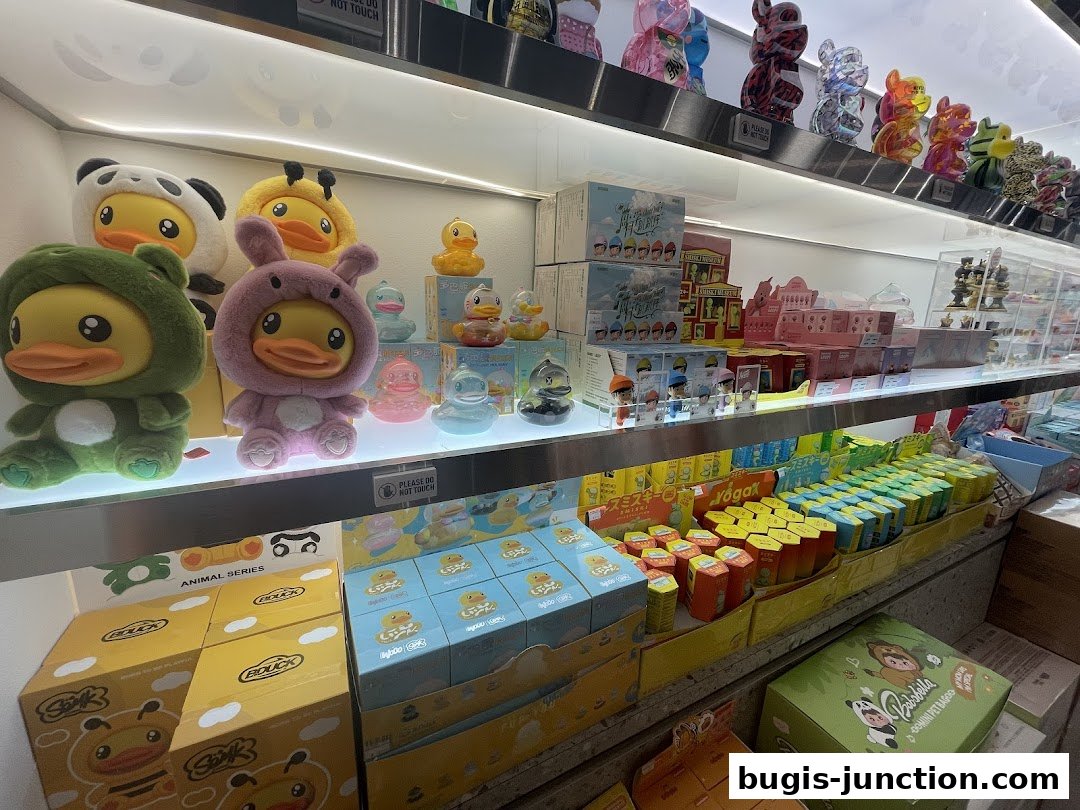 Shelves filled with cute duck-themed toys and collectible figures.
