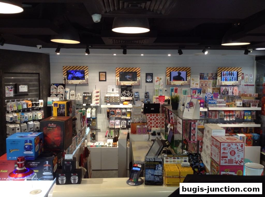 Interior view of a retail store filled with various electronic gadgets, toys, and accessories.