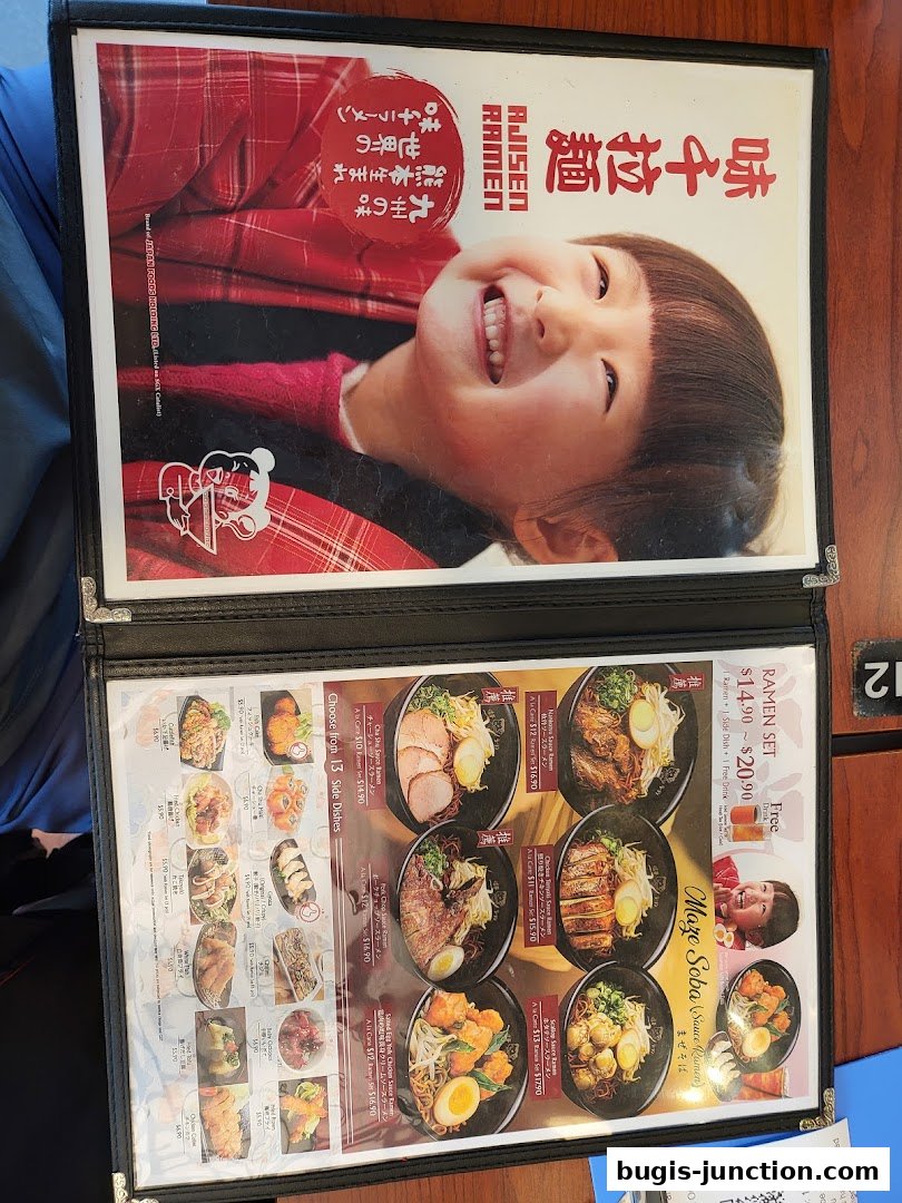 A menu from Ajisen Ramen featuring ramen sets, maze soba, and various side dishes.