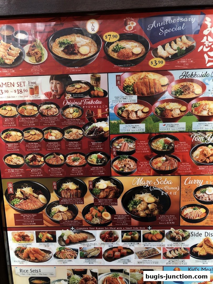 A colorful menu board displaying various ramen dishes, side dishes, and set meals from Ajisen Ramen.