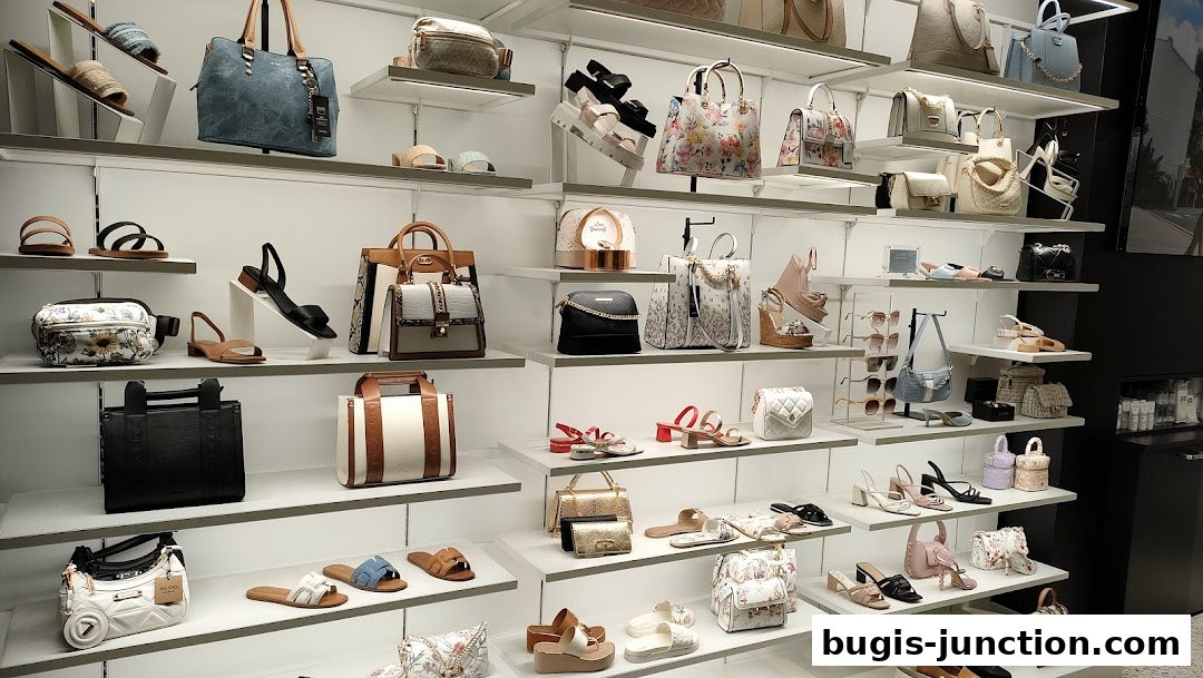 A well-lit display of ALDO handbags and shoes on shelves, showcasing various styles and colors.