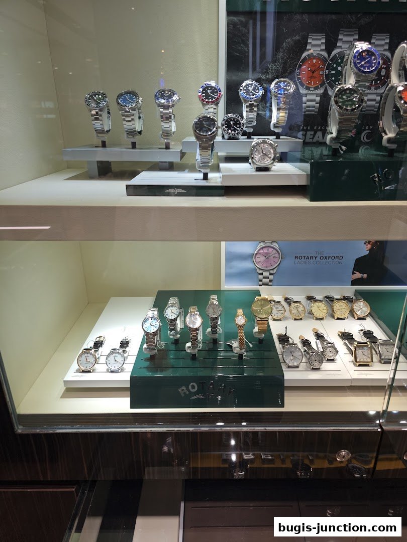 A display case filled with various luxury watches from different brands.