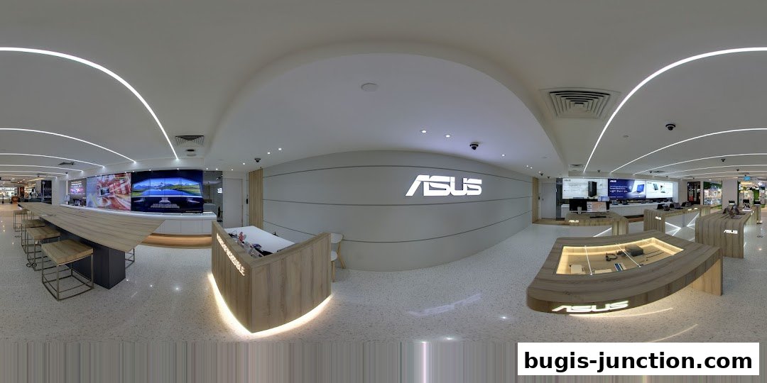 Interior view of a modern ASUS Exclusive Store showcasing products and displays.