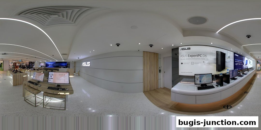 Interior view of an ASUS Exclusive Store showcasing computers and technology.