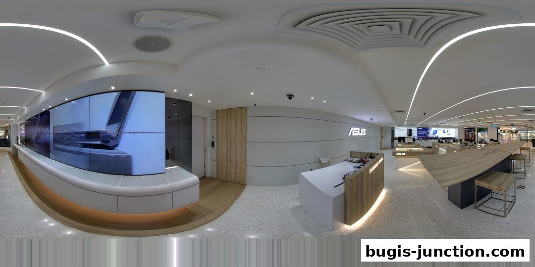 Interior view of the ASUS Exclusive Store with a large display wall and product showcases.