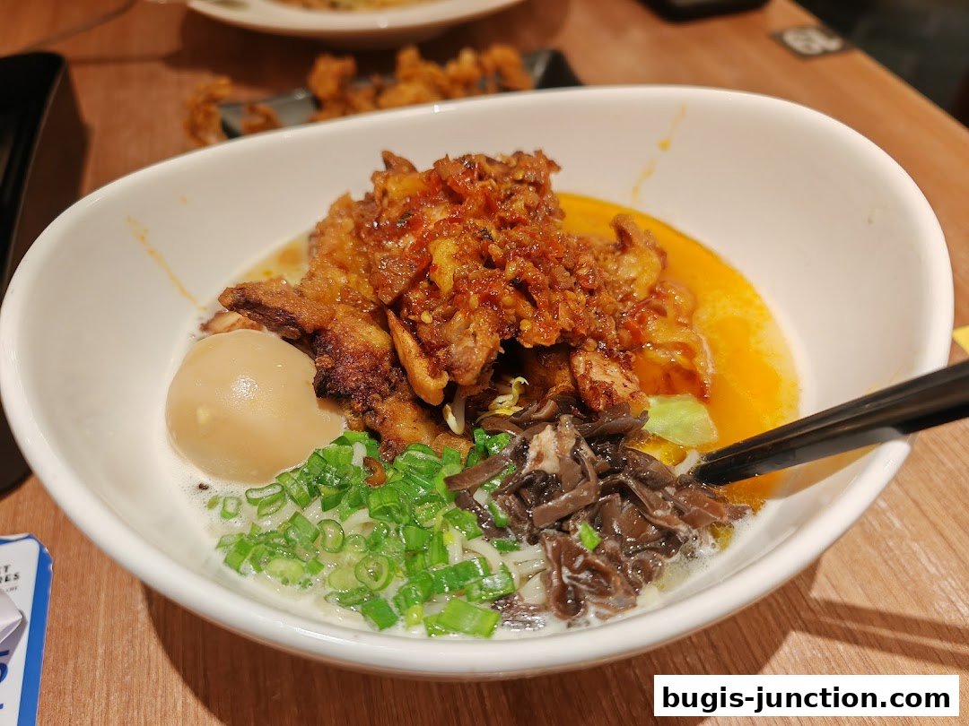 A close-up of a delicious bowl of Japanese ramen with rich broth and toppings.