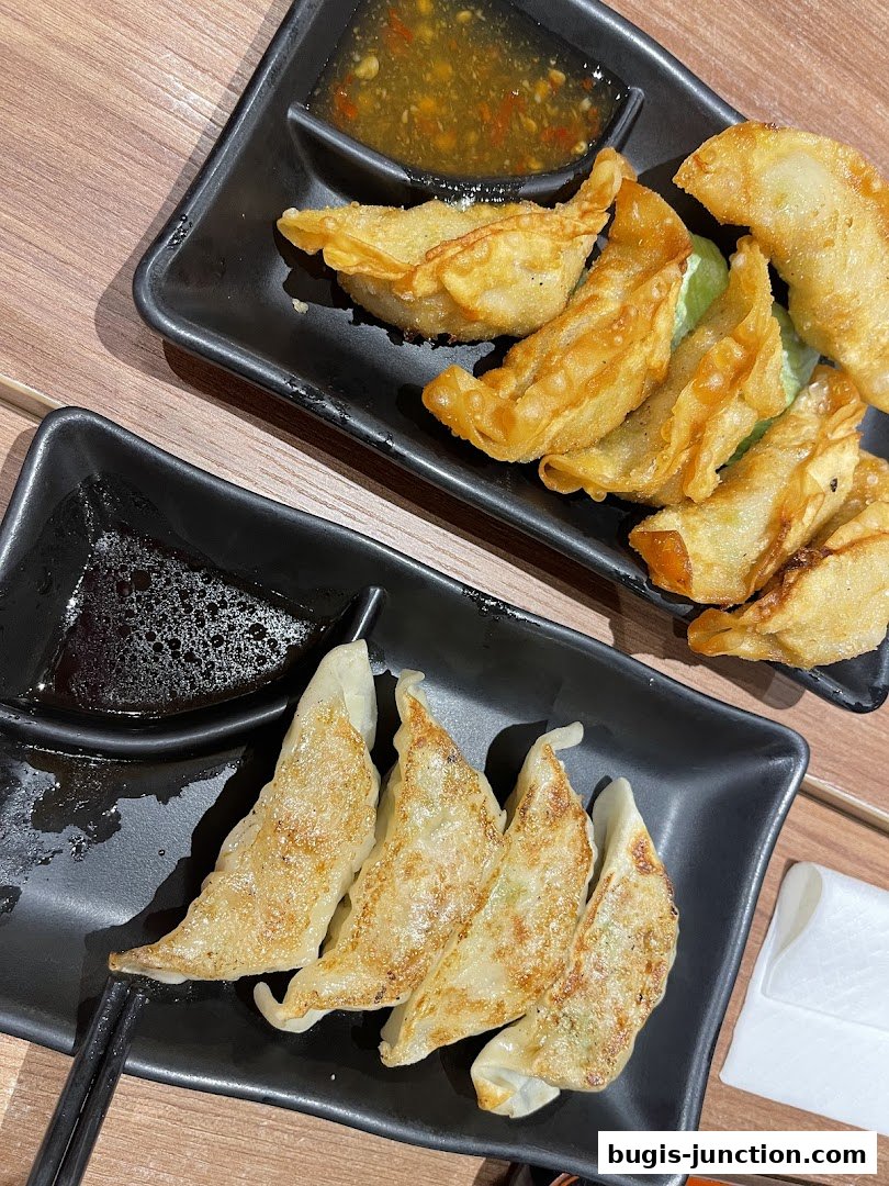 Two plates of Japanese dumplings, one fried and one pan-fried, served with dipping sauces.