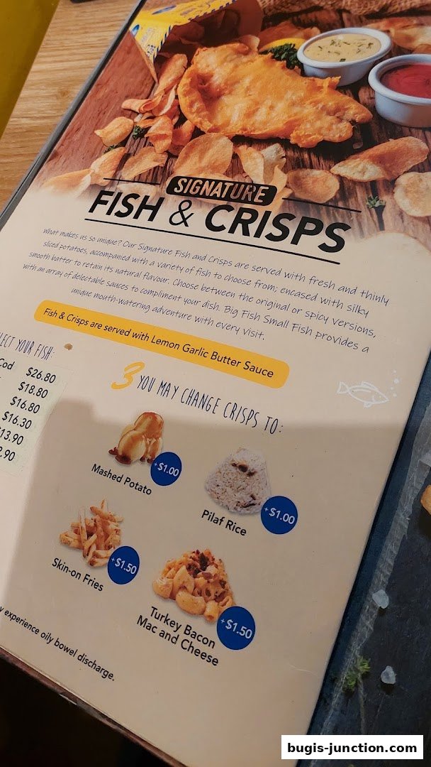 A menu showcasing signature fish and crisps with various side options.