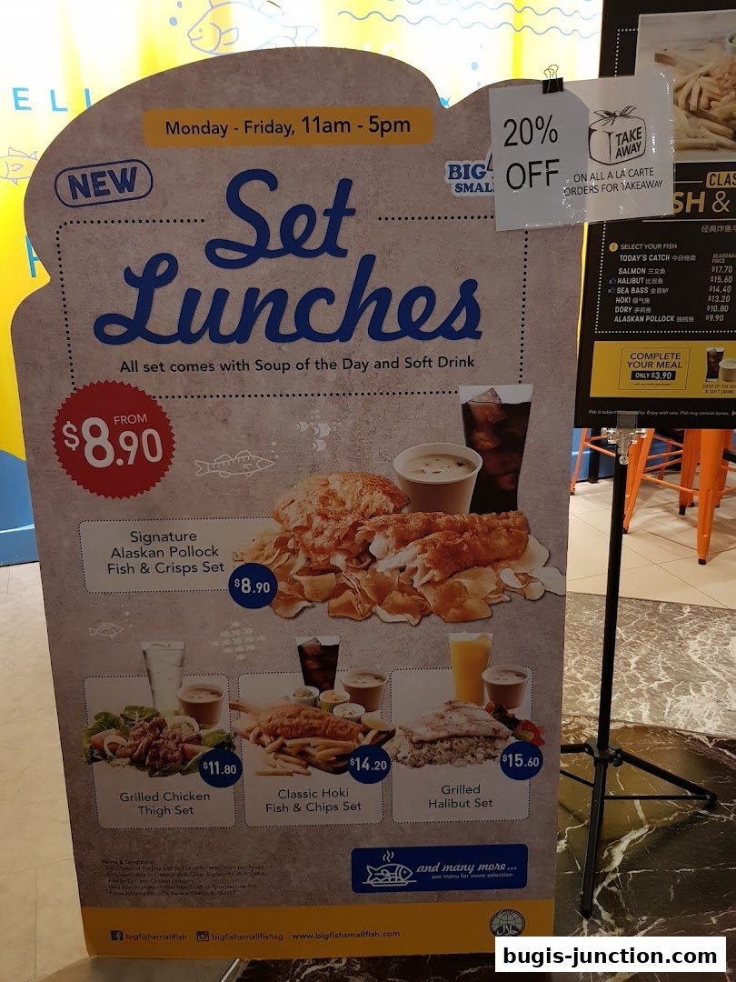 A promotional display for Big Fish Small Fish featuring set lunches and a la carte options.