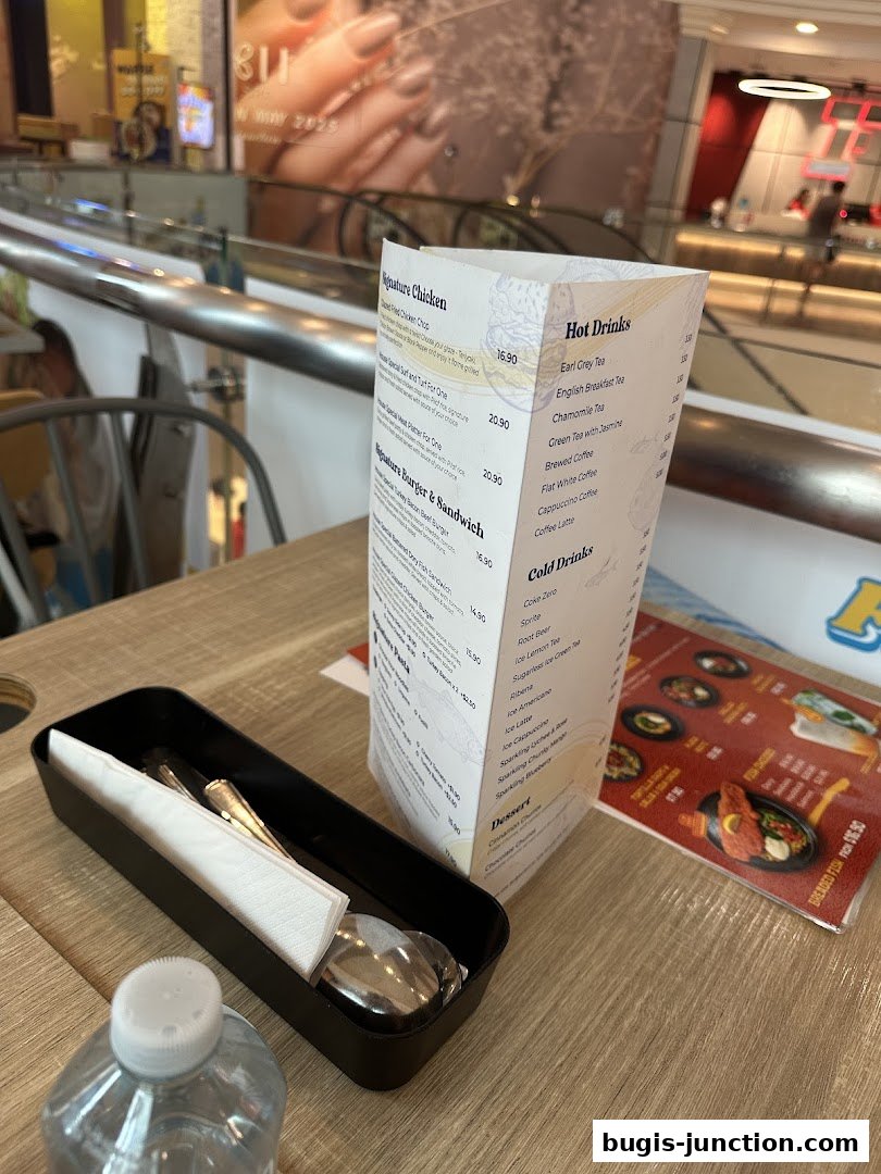 A menu from Big Fish Small Fish Bugis Junction with various food and drink options.