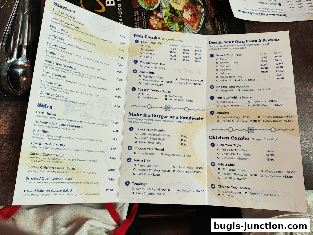 A menu from Big Fish Small Fish Bugis Junction featuring starters, sides, fish combos, pasta, and chicken combos.