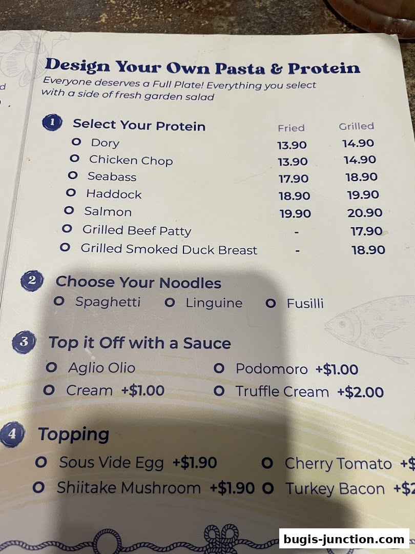 A menu for designing your own pasta and protein dish with various options.