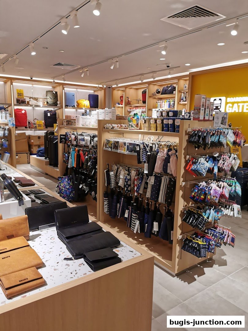 Interior view of a retail store displaying travel accessories, bags, and wallets.