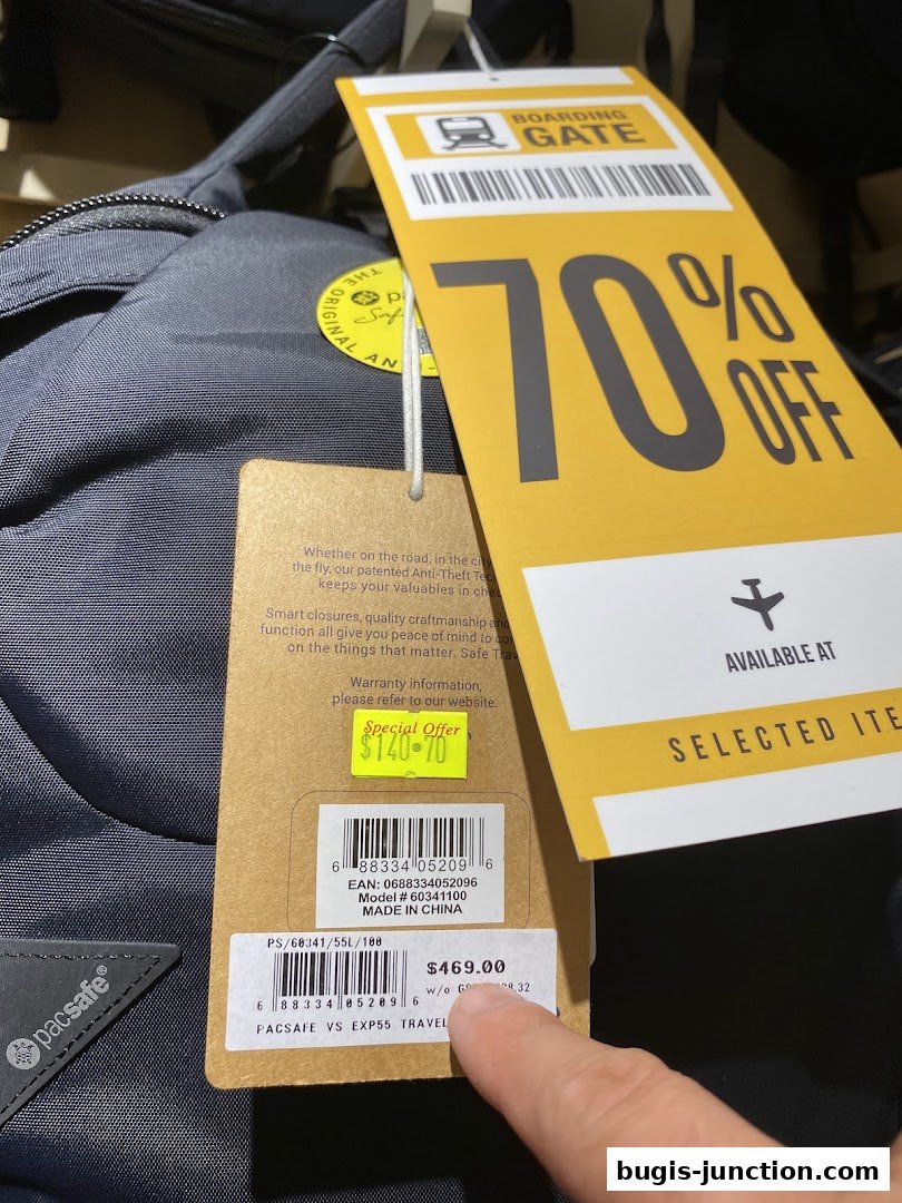 A backpack with a "Boarding Gate" tag offering 70% off and a price tag of $469.00.