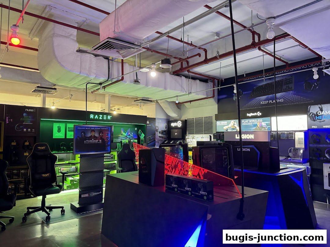 Interior view of a gaming and tech store showcasing Razer and Legion products.