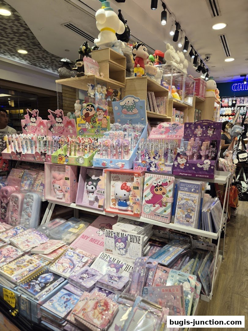A brightly lit shop interior filled with shelves of cute stationery, toys, and character merchandise.