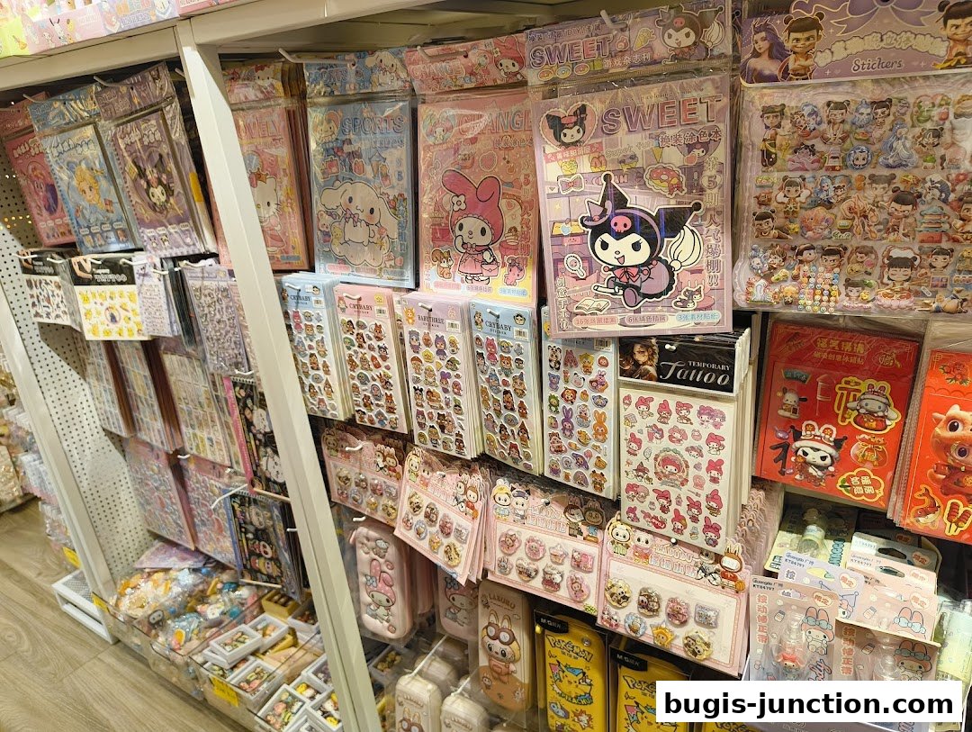 A retail display filled with various cute stickers, stationery, and novelty items.