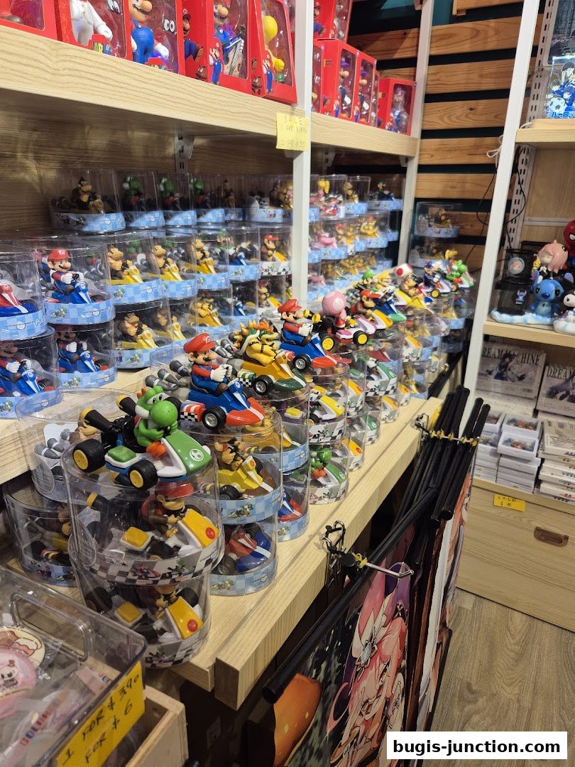 Shelves filled with Mario Kart character figures and other merchandise.