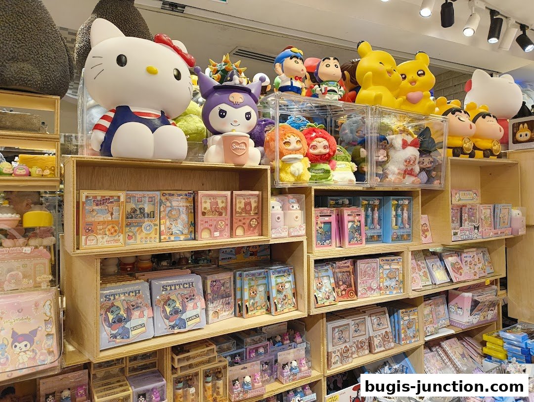 A retail shop interior filled with various character merchandise and collectibles.