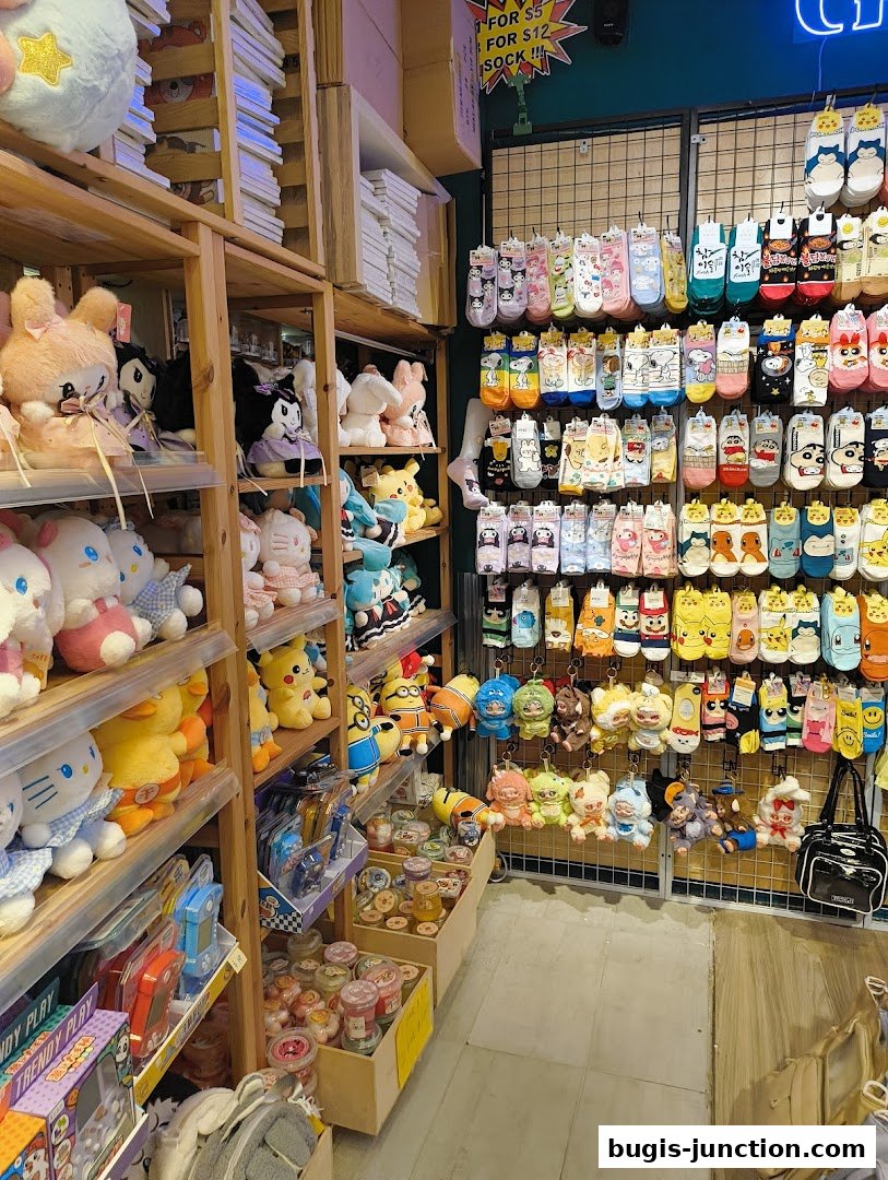 A retail shop interior filled with plush toys, socks, and accessories, organized on shelves and displays.