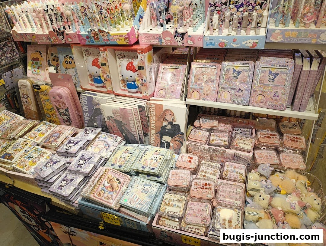A retail display filled with cute stationery, notebooks, and accessories featuring popular characters.
