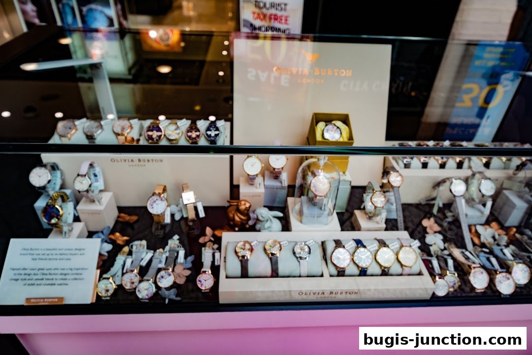 A display window showcasing a variety of Olivia Burton watches in different styles and colors.
