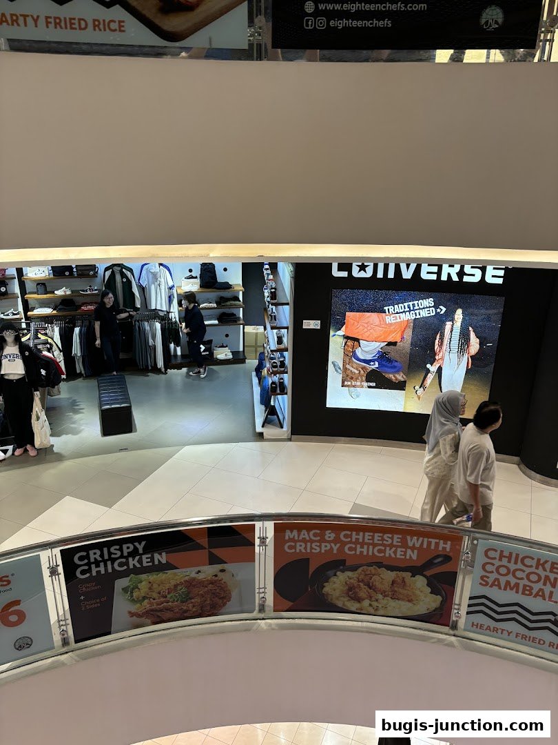 View of a Converse store interior and food advertisements from above.