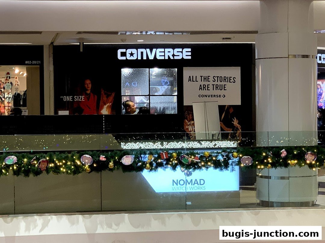 The Converse store front with its iconic logo and promotional signage.