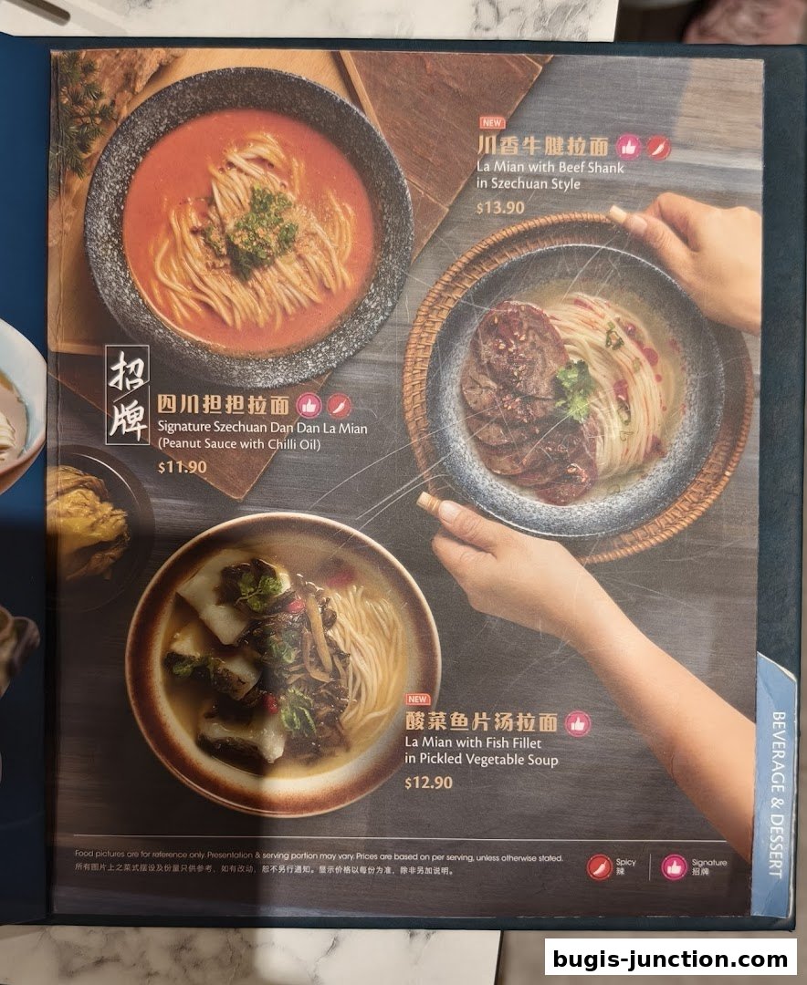 A menu featuring three different noodle dishes with detailed descriptions and prices.