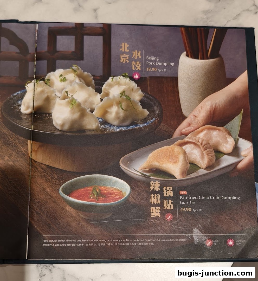 A menu page showcasing delicious Beijing Pork Dumplings and Pan-fried Chilli Crab Dumplings.