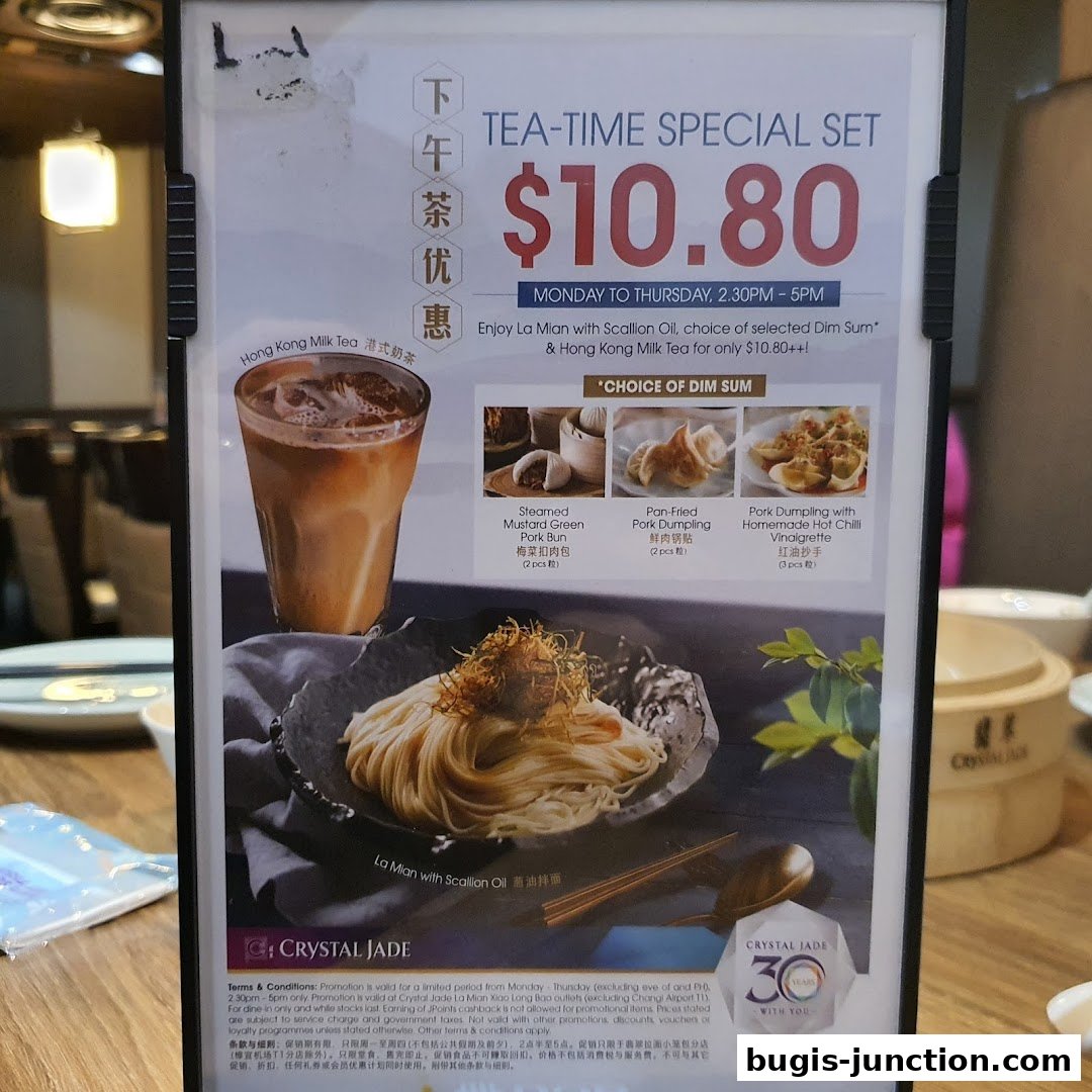 A menu featuring a tea-time special set with noodles, dim sum, and milk tea.