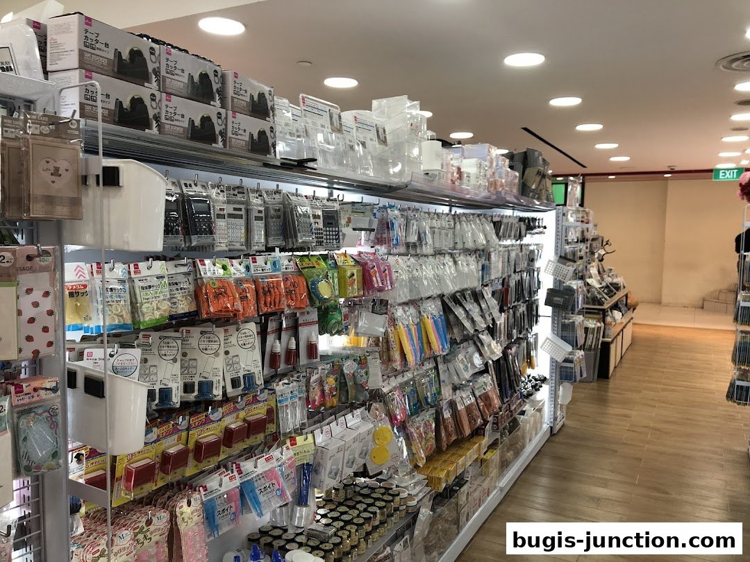Interior view of a Daiso store showcasing shelves filled with various household and stationery items.