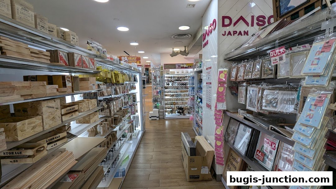 Interior view of a Daiso store showcasing shelves filled with various products like wooden boxes and picture frames.