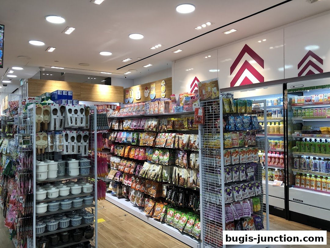 Interior view of a Daiso store showcasing shelves filled with snacks, kitchenware, and beverages.