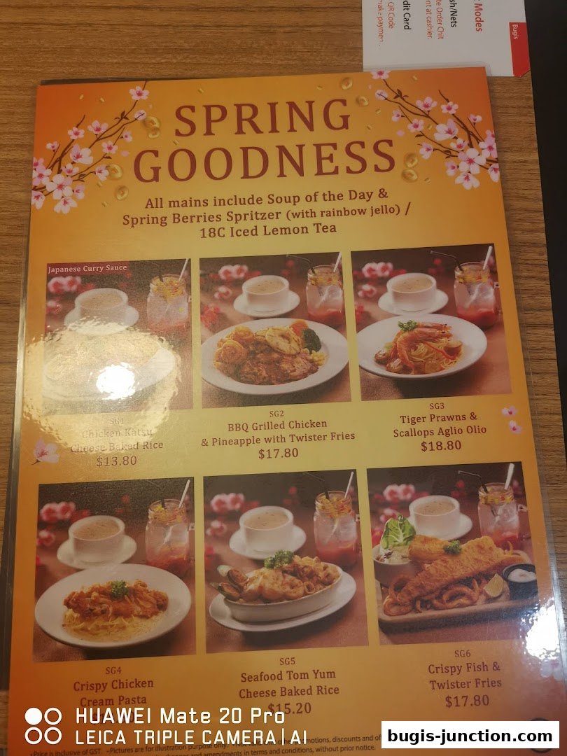 A menu featuring 'Spring Goodness' with various main dishes and drinks.