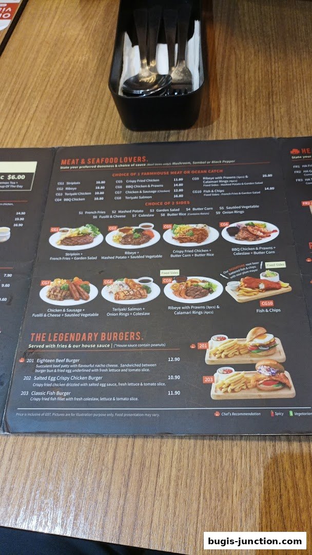 A menu from Eighteen Chefs Bugis Junction featuring meat, seafood, and burgers.