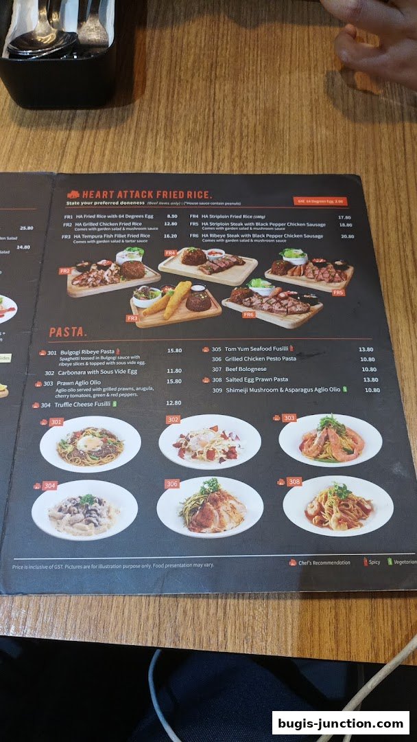 A menu from Eighteen Chefs Bugis Junction featuring pasta and fried rice dishes.