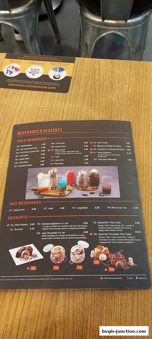 A menu from Eighteen Chefs Bugis Junction featuring beverages and desserts with enticing images.