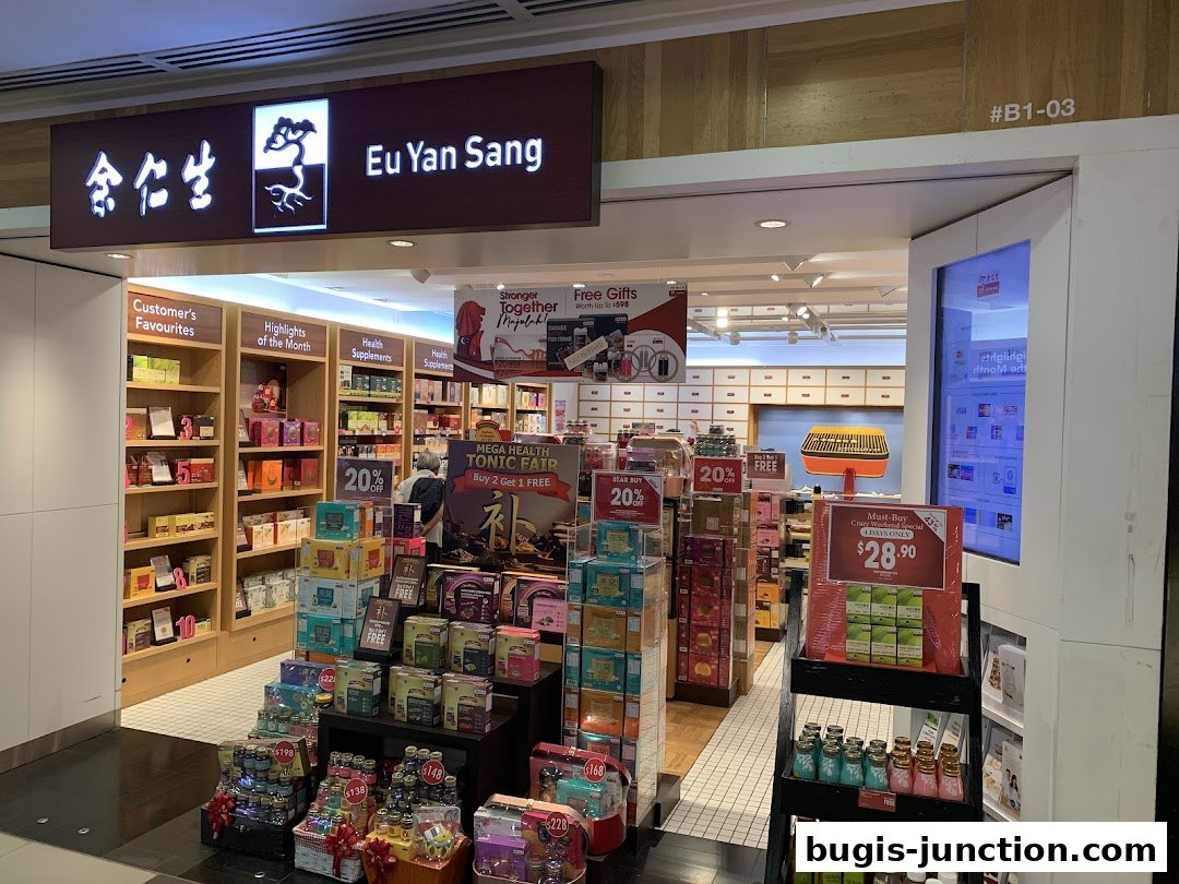 The entrance of Eu Yan Sang, a health and wellness store, showcasing various products and promotions.