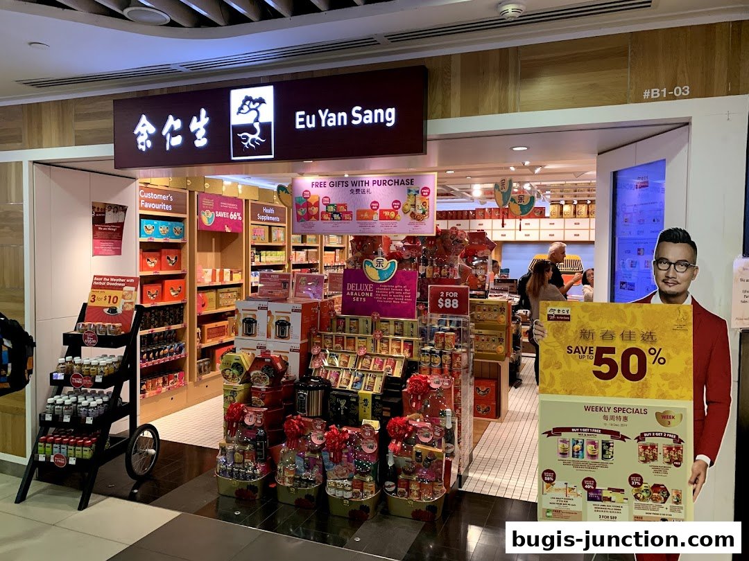 Eu Yan Sang shop front displaying health supplements, gift sets, and promotional offers.
