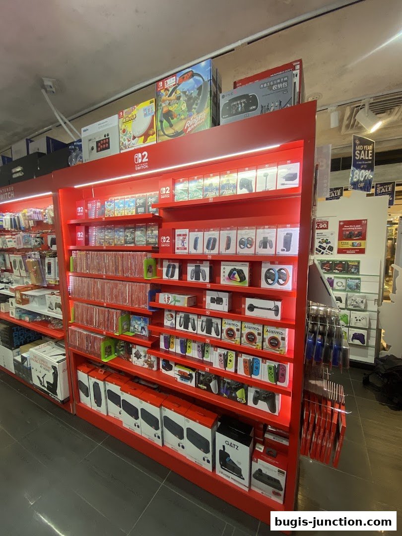 A brightly lit retail store display featuring Nintendo Switch games and accessories.