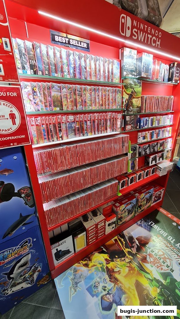 A display shelf filled with Nintendo Switch games and accessories, featuring a 'Best Seller' sign.