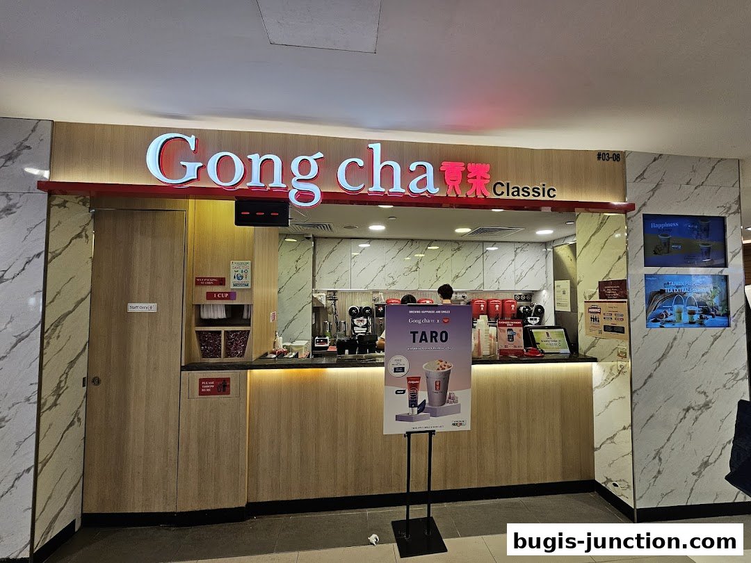 The exterior of a Gong Cha Classic bubble tea shop with a prominent sign and counter.