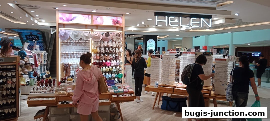 A brightly lit shop interior showcasing a wide variety of hair accessories and hats.