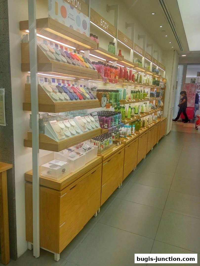 Innisfree Bugis Junction shop interior with shelves displaying various beauty products.