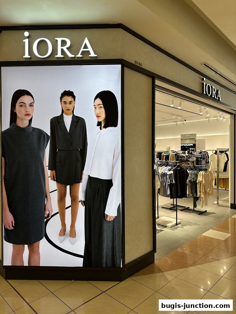 The iORA Bugis Junction shop front features a large display with three models and the store's interior visible.