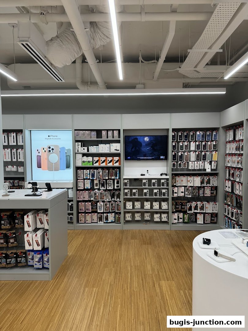Interior of an iStudio store showcasing a wide selection of iPhone accessories and displays.