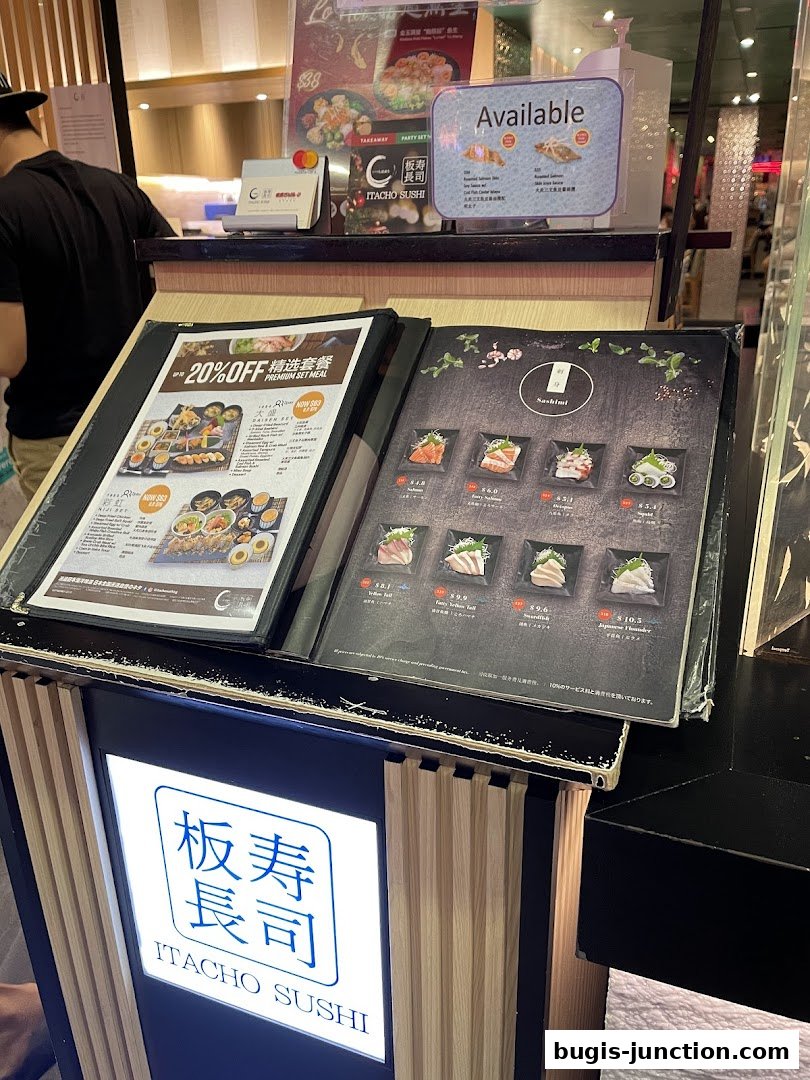 A display of menus for Itacho Sushi, showcasing various sushi and sashimi options.