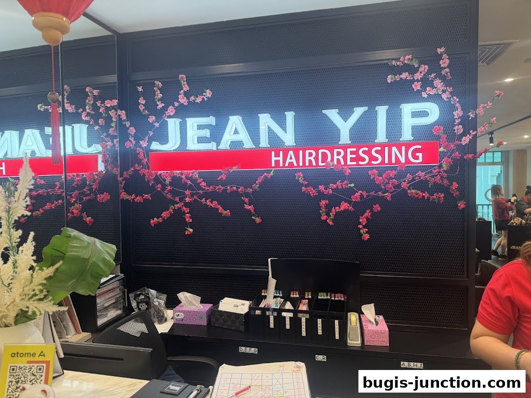 The reception area of Jean Yip Hairdressing and Beauty, decorated with cherry blossoms.